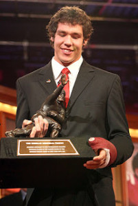 Bradford accepting the Heisman Trophy.