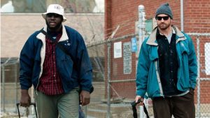 Chris Long and William Hayes walk the streets of St. Louis while living homeless for a day. Photo from the St. Louis Rams.