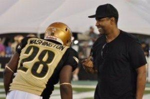 John David Washington with his father, Denzel before a game with the Sacramento Mountain Lions.