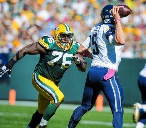 A popular sight from today's game: Nick Foles being pressured on a throw. Photo via Getty Images.