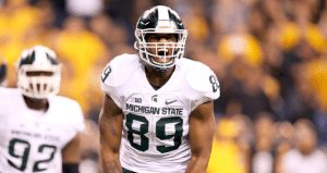 Michigan State's Shilique Calhoun celebrates after the final whistle in the Big Ten Championship game. Photo via ESPN.