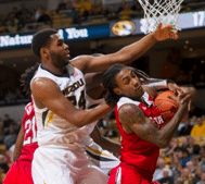 Kevin Puryear attempts to block Cat Barber in Mizzou's 73-59 loss against NC State on Saturday, Dec. 19, 2015. The Tigers dropped to 5-5 on the year.