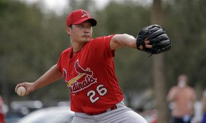 St. Louis Cardinals pitcher Seung Hwan Oh, of South Korea, throws a bullpen session during spring training baseball practice Sunday, Feb. 21, 2016, in Jupiter, Fla. (AP Photo/Jeff Roberson) ORG XMIT: FLVR